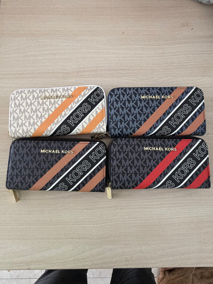 Lote 12 Carteras Mod. MK Rayas
