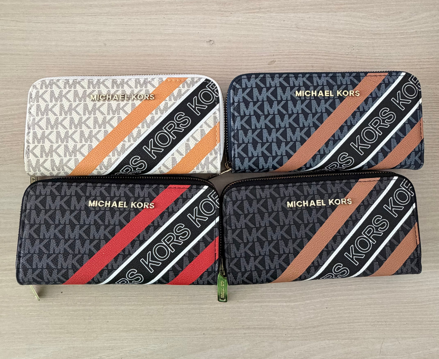 Lote 12 Carteras Mod. MK Rayas